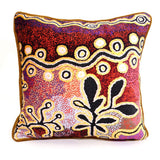 Decorative pillow with intricate patterns on a white background