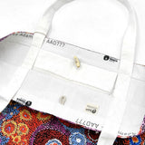 Interior of a canvas tote bag from Better World Arts and based on artwork by Andrea Mimpitja Adamson.