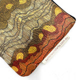 Decorative dart case with abstract pattern and 'betterworldarts.com.au' tag on a white background