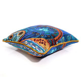Decorative pillow with intricate patterns on a white background