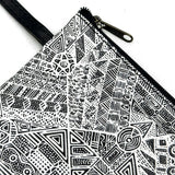 Zipper pouch with black and white geometric pattern on a white background