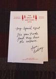 Note with handwritten text on a card from 'The Great Northern Hotel' with red text and logo.