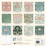Back cover of a calendar featuring William Morris wallpaper designs with branding and publication details.