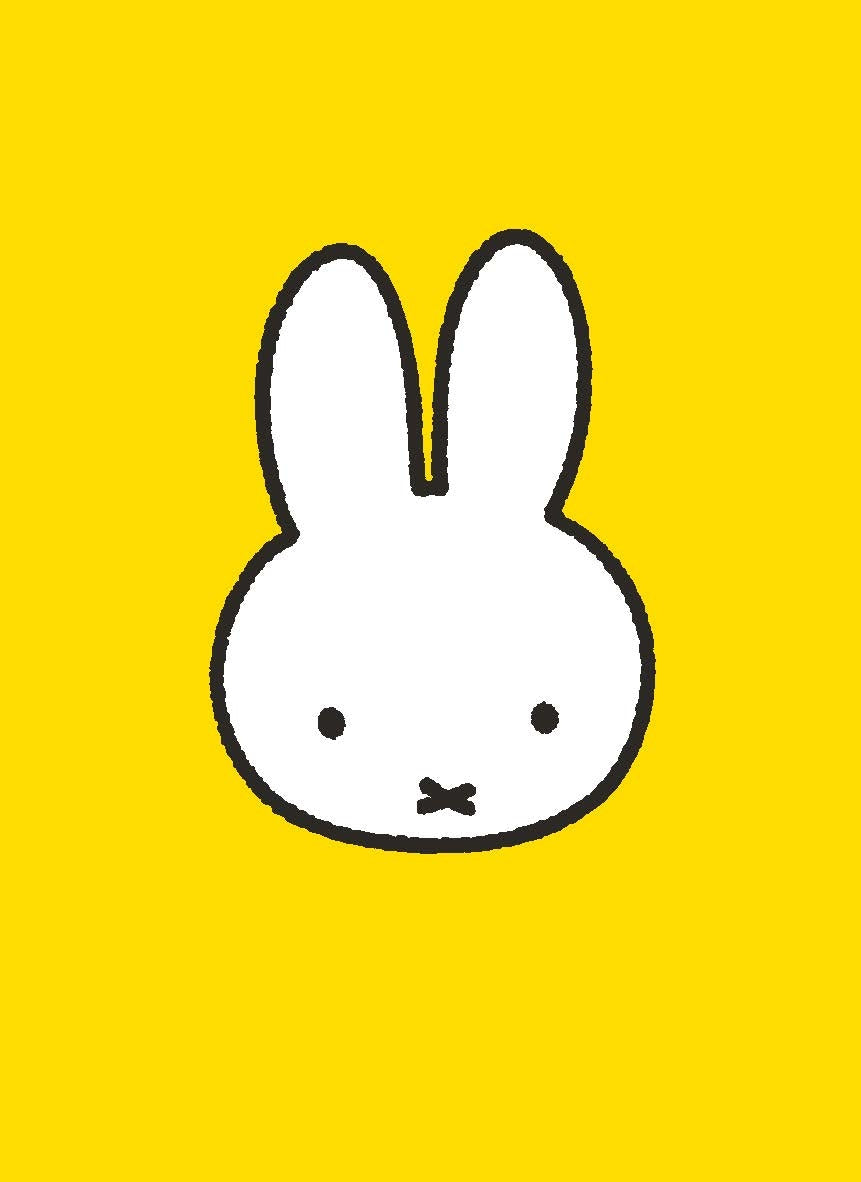 Cartoon bunny face on a yellow background
