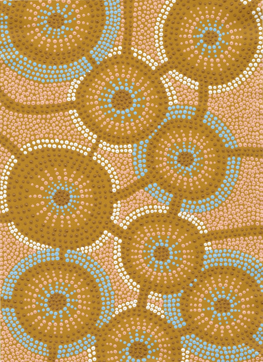Patterned fabric with circular designs in brown and blue on a brown background