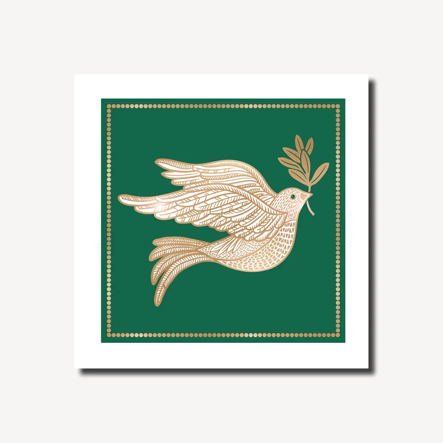 A square dark green christmas card iwth a gold and white dove