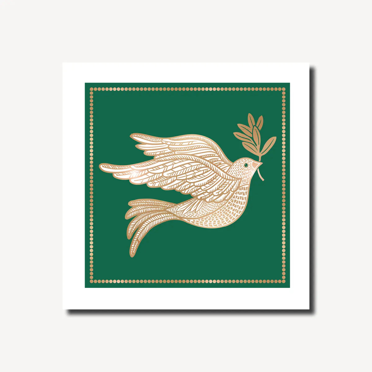 A square dark green christmas card iwth a gold and white dove