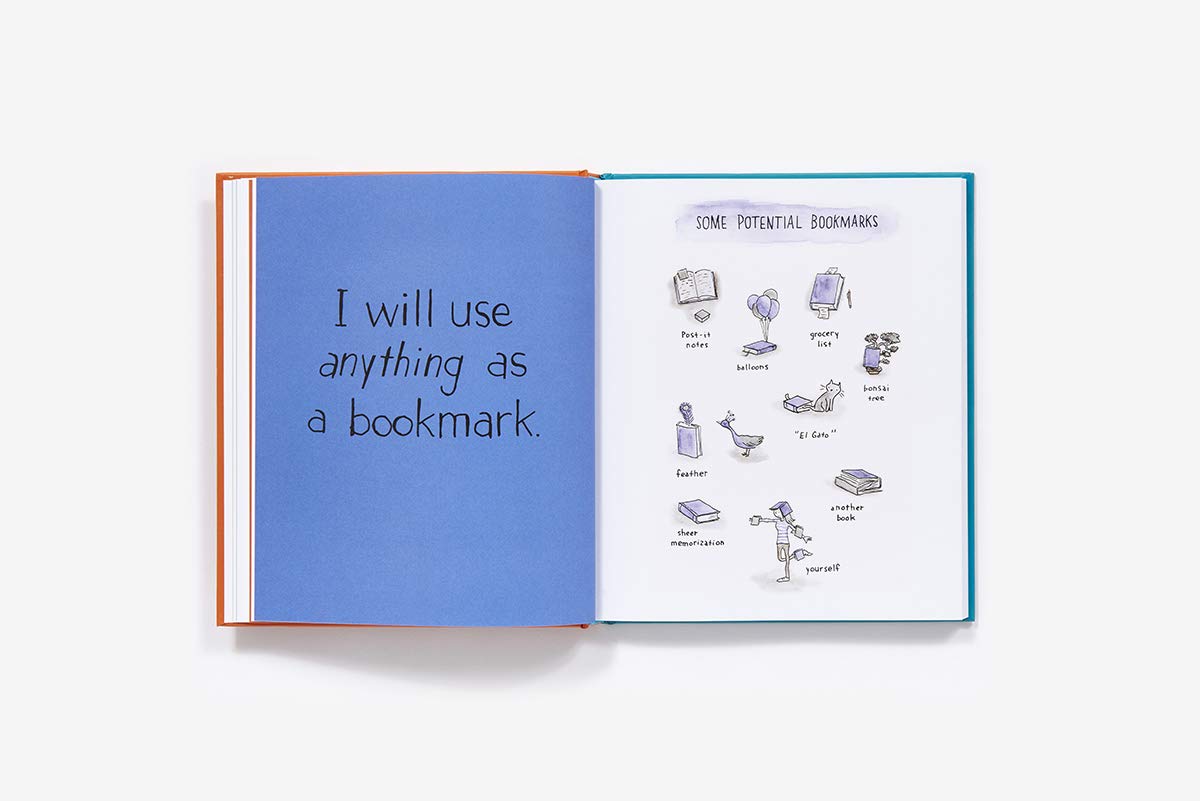 Open book with blue pages and illustrations on a white background