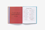 Open book with text and proofreader's marks on a white background