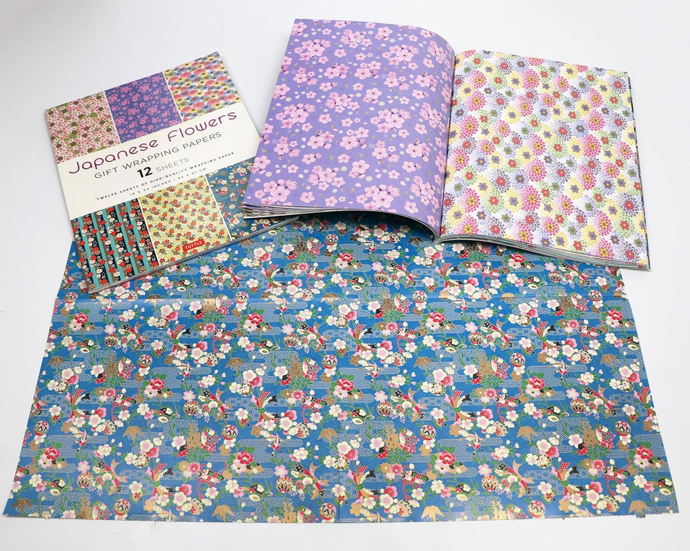 Set of floral-patterned gift wrap paper with a visible brand label on a white background.