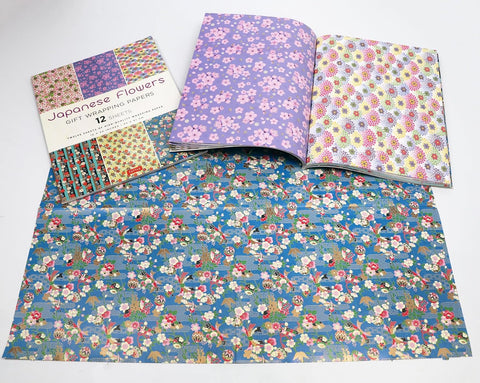 Set of floral-patterned gift wrap paper with a visible brand label on a white background.