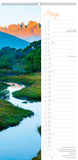 Calendar page for May showing a scenic landscape with a river and mountains.