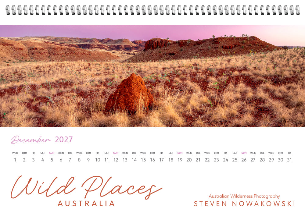 Calendar for December 2027 featuring a termite mound in a desert landscape with 'Wild Places Australia' branding.