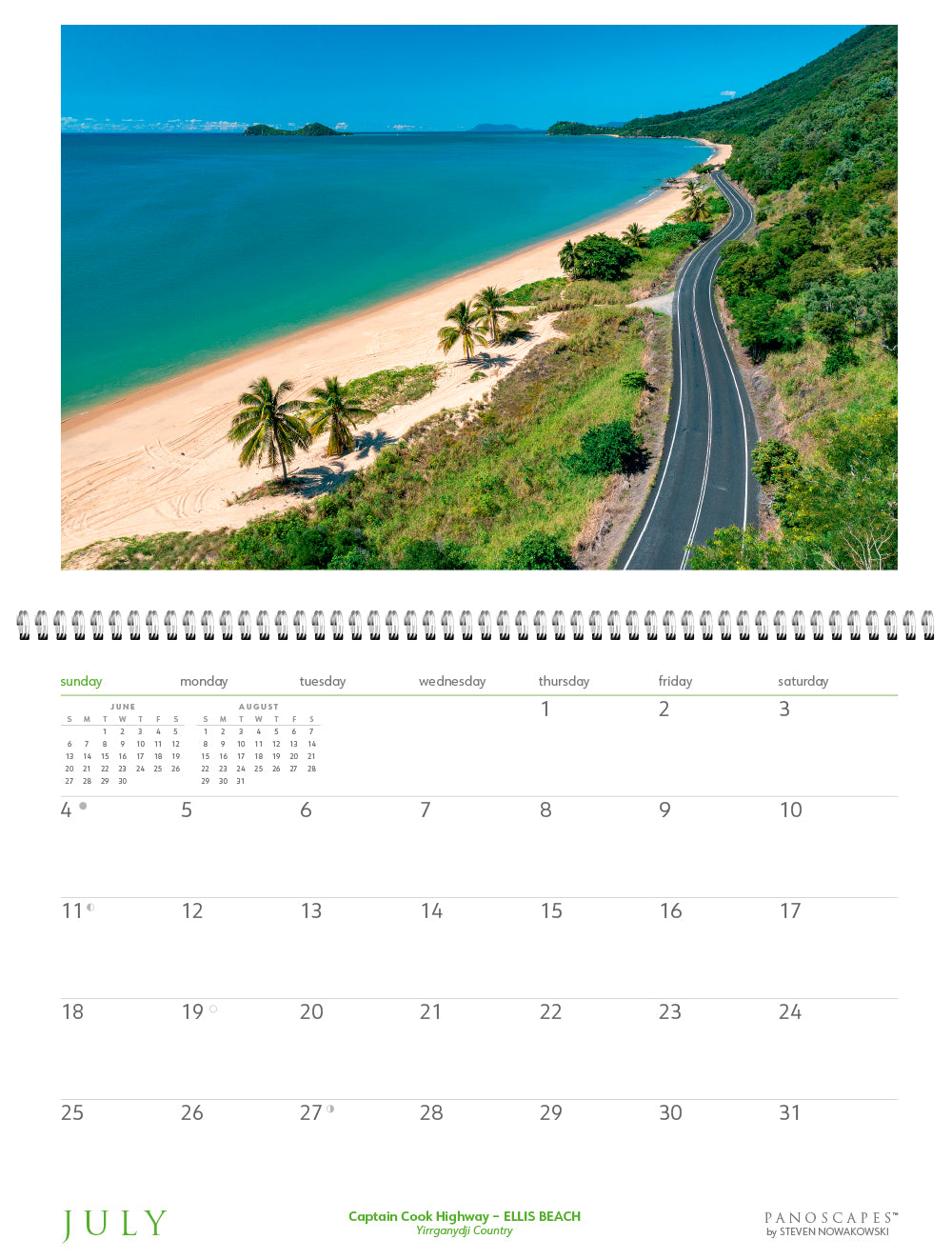 Calendar with a scenic road and beach cover, featuring the month of July.