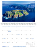 March page of calendar with photo of mountainous islands in a sea.