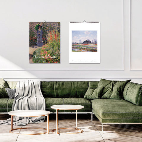 Two wall calendars featuring artwork by Claude Monet in a living room setting.