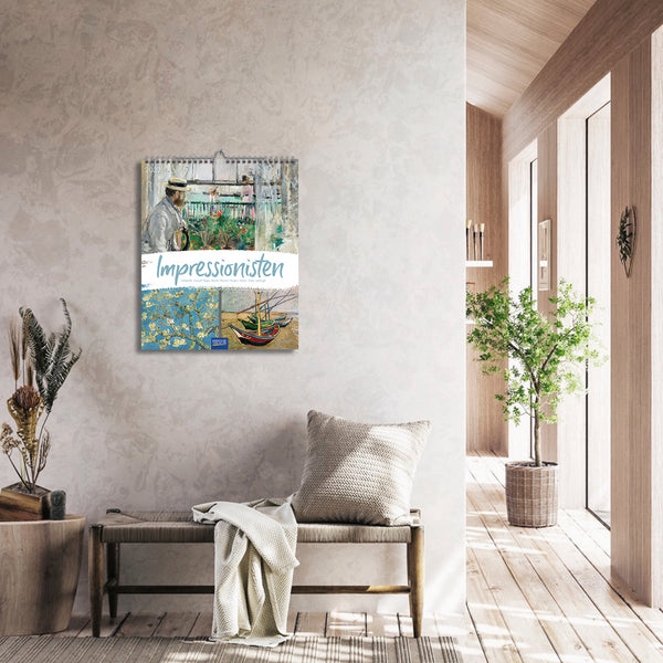 Modern interior with a calendar featuring an Impressionist painting on the wall.