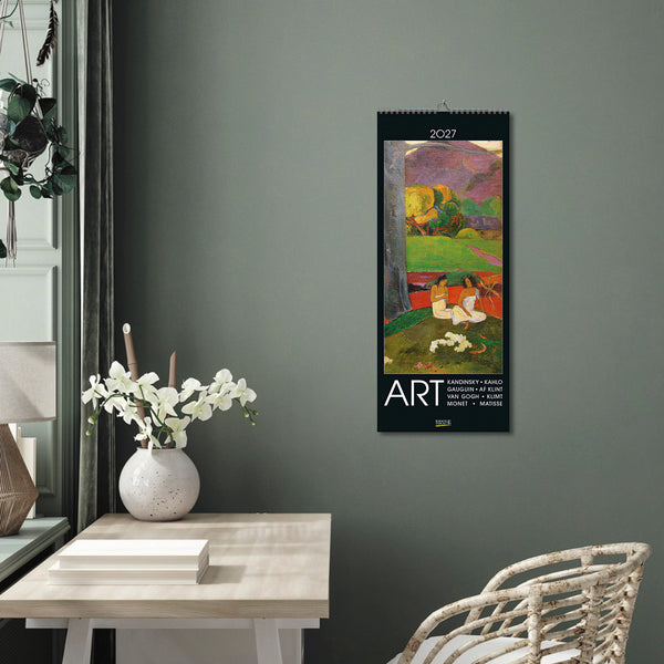 A room with green walls and a large Art Calender on the wall.