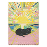 Notebook with a colorful design of a cat and sun, on a white background