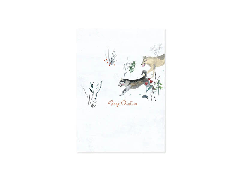 Christmas card with huskies and deer design on a white background