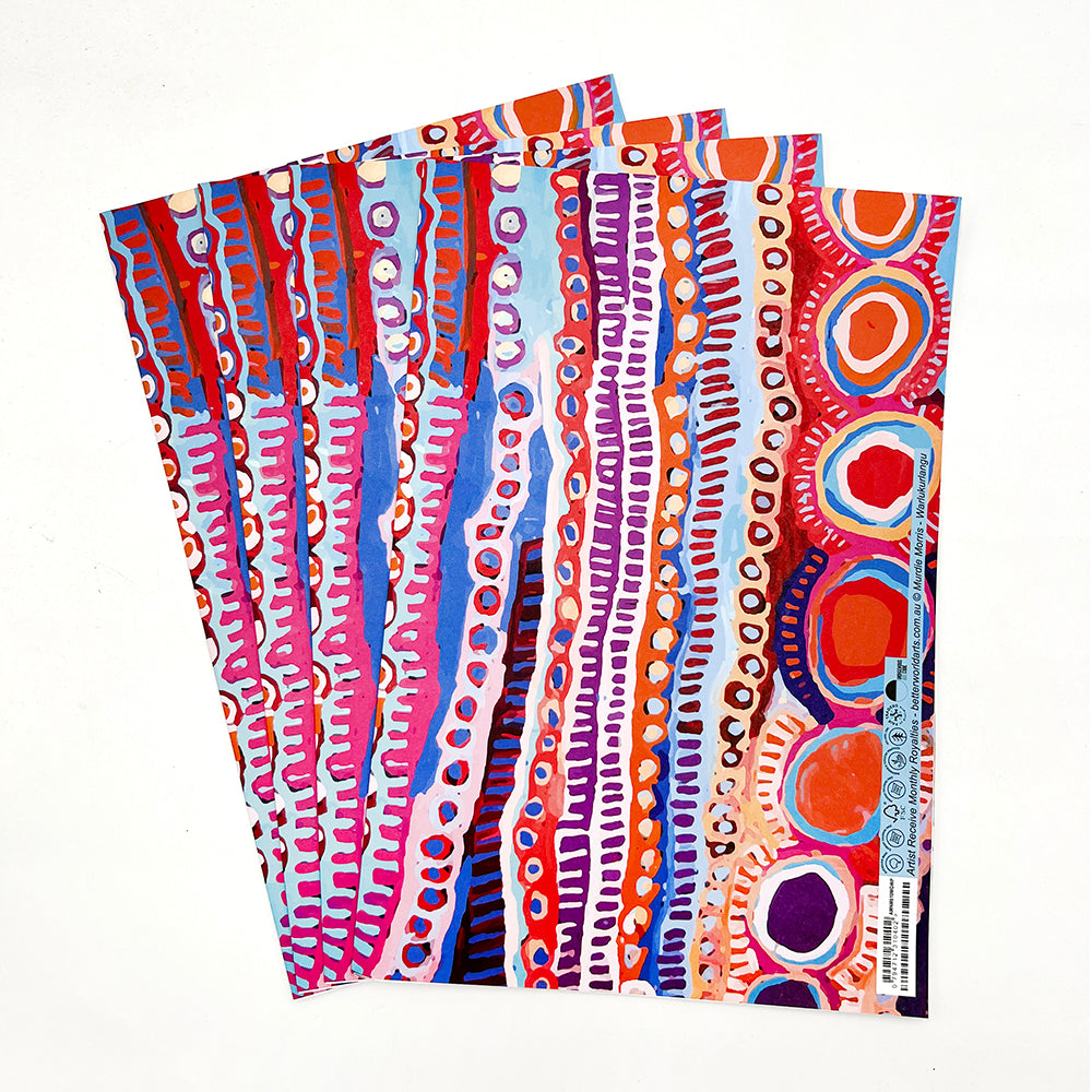 A fan of colorful patterned paper sheets with abstract hand-drawn designs in red, pink, blue, purple, orange, and white on a plain white background.