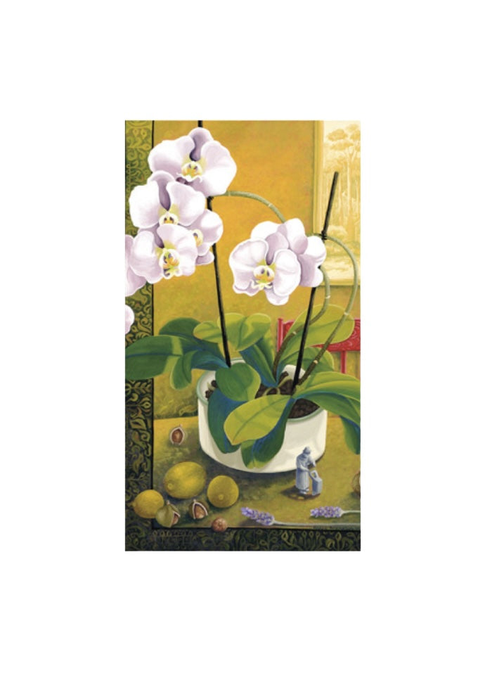 A pot with a pale pink orchid on a table with other objects.