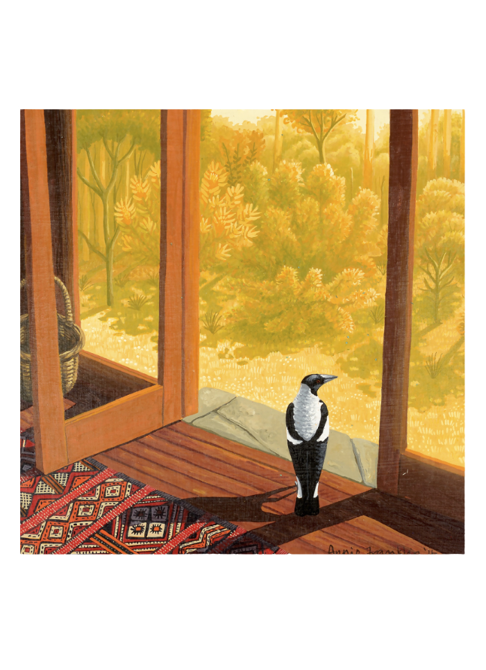 A square art print depicting a black and white bird standing on a wooden floor by large windows, looking out onto a golden-yellow forest. The scene includes a patterned rug in the foreground and is presented with a white border. Annie Franklin art card - Autumn Morning with Magpie.