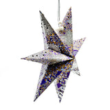 Decorative star-shaped lantern with a floral pattern on a white background