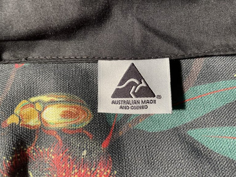 Fabric with a colorful design and 'Australian Made and Owned' label.