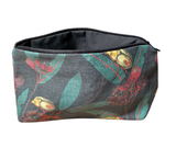 Fabric pouch with floral design on a white background