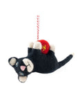 Felted cat ornament with a red ball on a white background