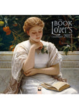 Calendar cover featuring a woman reading a book with decorative elements and 'The Book Lover's' branding.