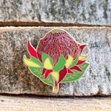 Decorative flower-shaped object on a textured stone surface