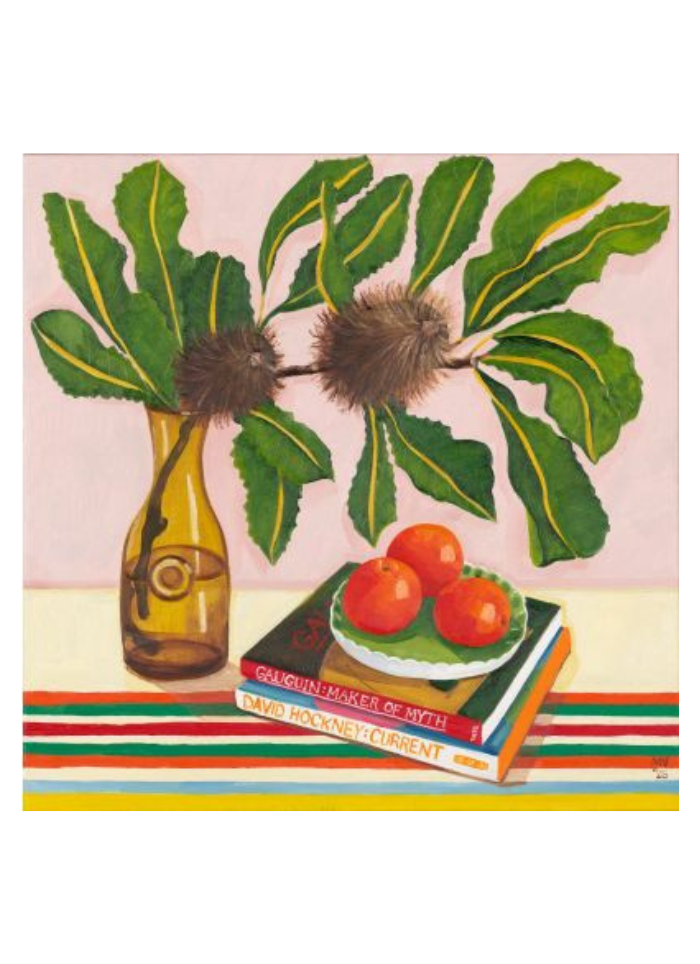A glass vase with a banksia in it, a stack of books and a plate of oranges