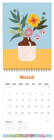 Calendar for March with a vase of flowers on a blue background