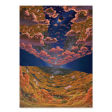 Surreal landscape with a cloud-filled sky and a valley below.