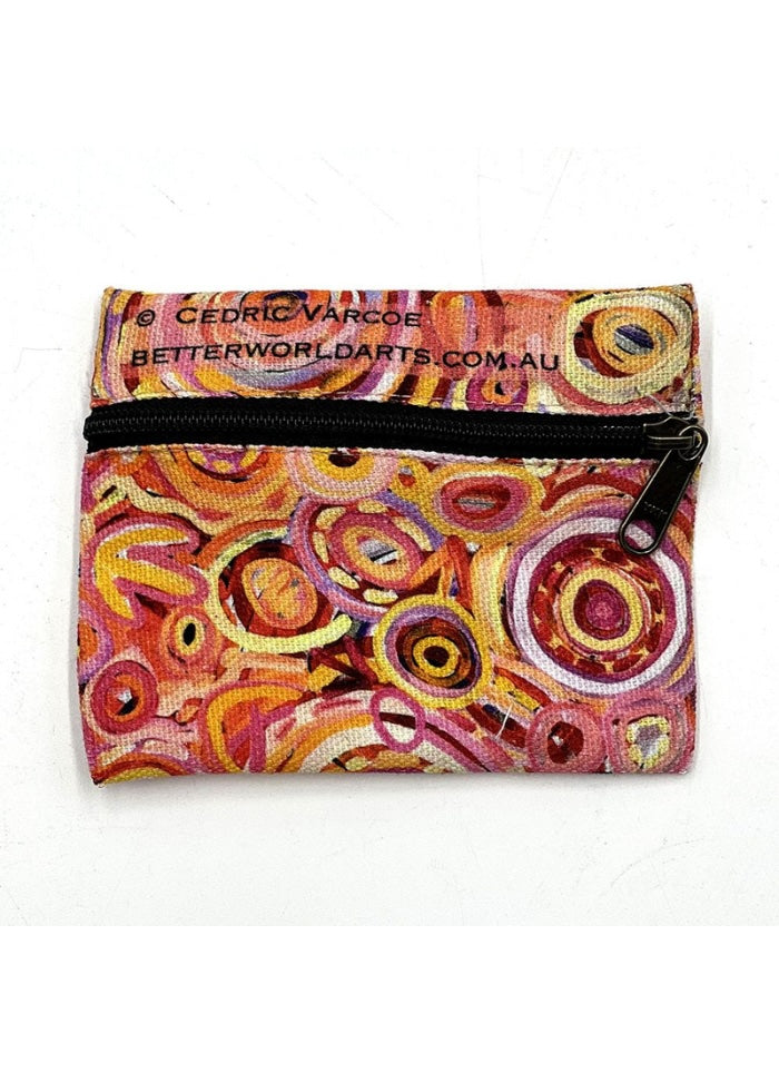 A small coin and card purse made using art by Cedric Varcoe.