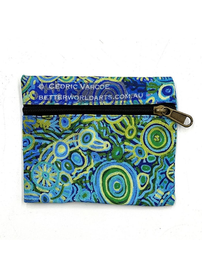 A small coin and card purse made using art by Cedric Varcoe.