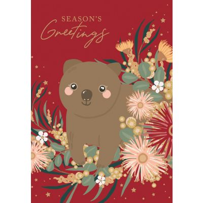 a red card with a wombat and flowers on a red background