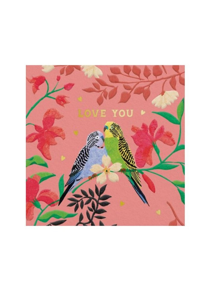 Budgies in blue and green on a pink background with the words Love You in gold lettering