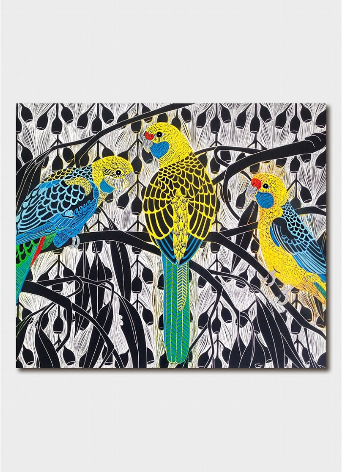Decorative panel with three colorful parrots on a branch against a black and white patterned background.
