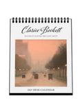 2027 desk calendar by Clarice Beckett with a painting of a street scene on the cover.