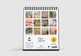Calendar with artistic cover featuring multiple small images on a white background