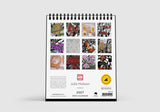 Desk calendar with floral designs on a white background