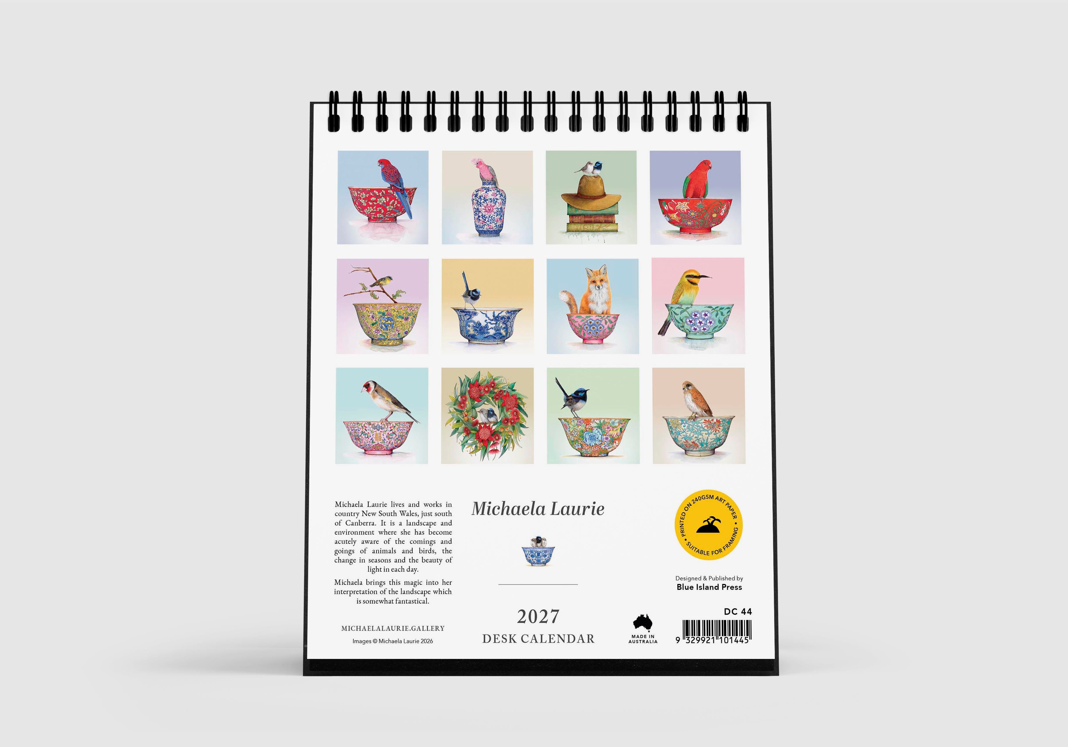 Desk calendar with illustrations of birds and teacups on a white background