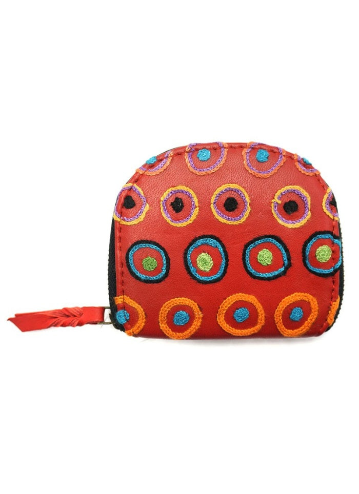 Colorful pouch with circular patterns on a white background