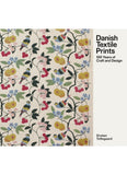 Book cover with Danish textile print design and text about 100 years of craft and design.