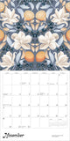 Calendar with floral and fruit design, featuring oranges and blueberries on a gray background.
