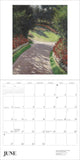 Calendar page for June with a garden path illustration