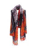 An organic cotton scarf with artwork by Edward Malati Yunupingu.